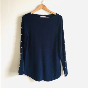 NWOT sweater with soft gold button along sleeves